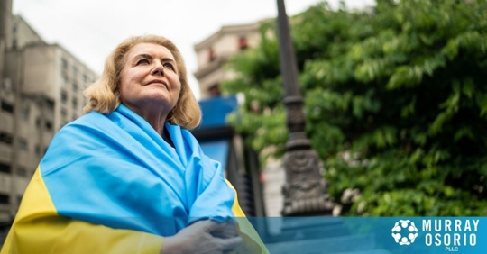 Woman wearing a blue and yellow shawl