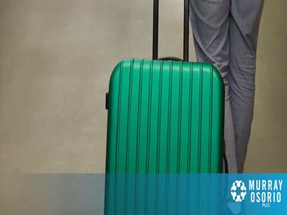 Pulling Green Suitcase